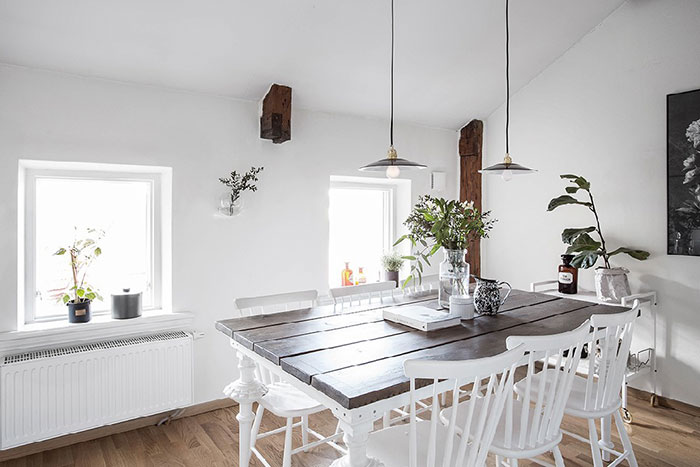 خانه مدرن و خلاقانه با تیرک های چوبی از آثار به جا مانده از خانه قدیمی در سوئد